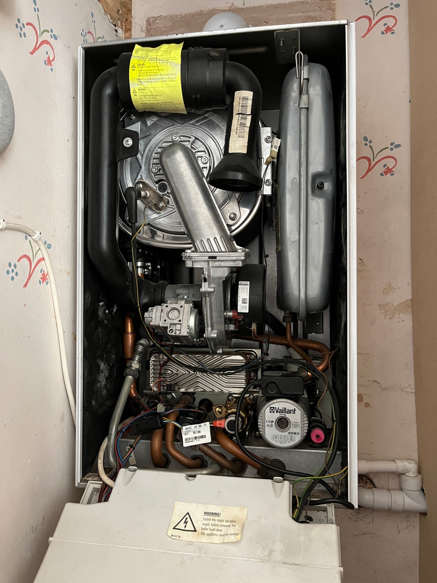 Vaillant boiler internals inspected during a repair visit