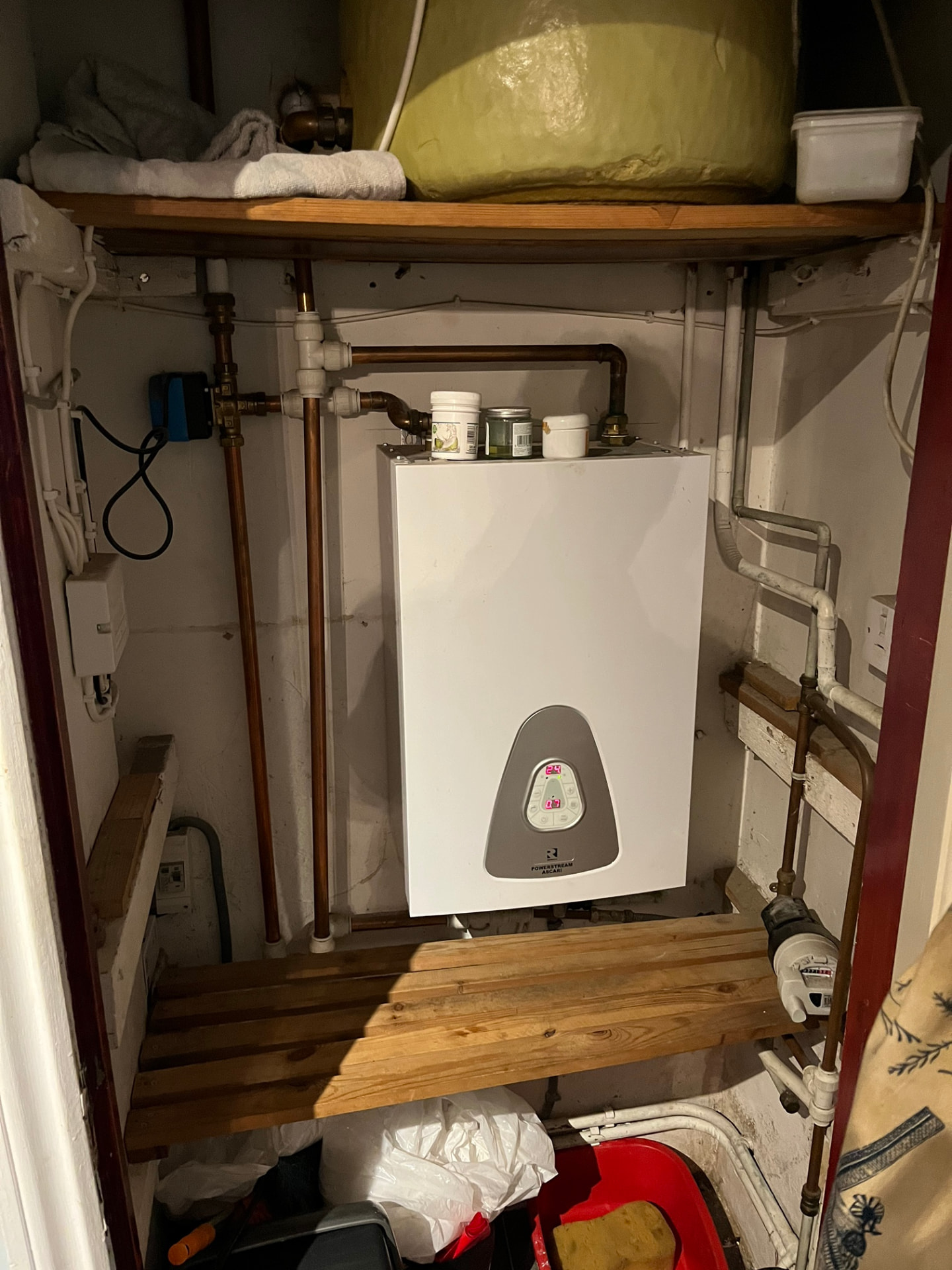 Combi boiler in an airing cupboard diagnosed after a breakdown